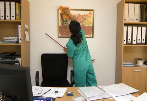 Employee Cleaning Office